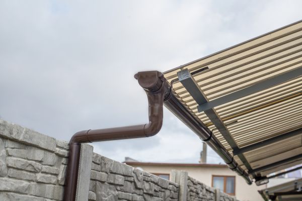 Plastic Downspout Installation in Maineville